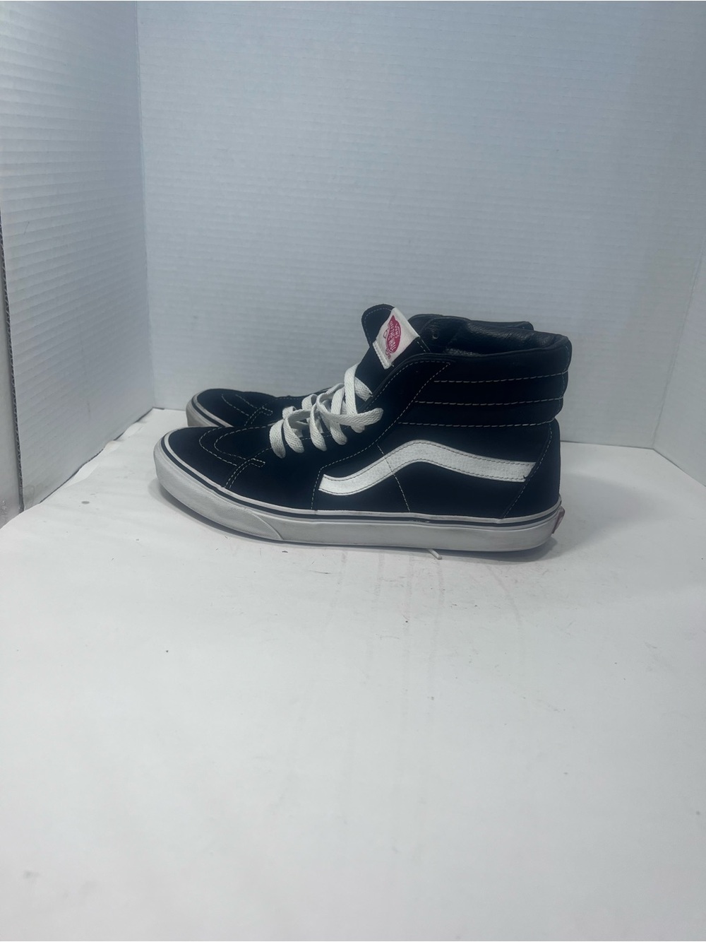 Vans Men’s Black and White High-Top Sneakers